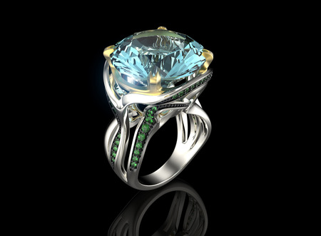 Golden Engagement Ring with Aquamarine. Jewelry backgroundの写真素材
