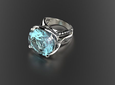 Golden Engagement Ring with Aquamarine. Jewelry backgroundの写真素材