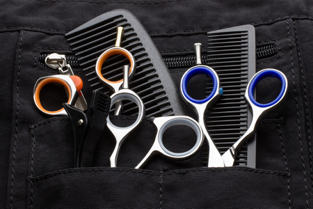 professional tools of hairdresser in black case