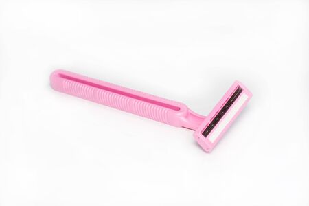 Razor is non-permanent rose on a white backgroundの写真素材