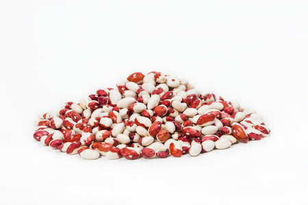 Small pile of beans isolated on white backgroundの写真素材