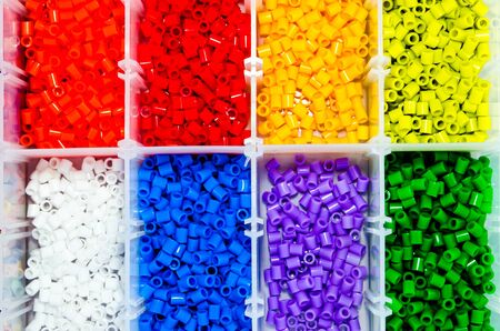 Full Color Beads On White Background, Close Up.