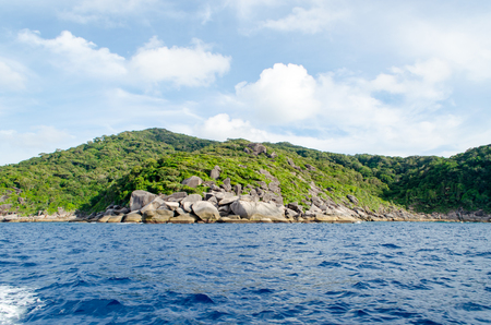 Beautiful Seascape with Focus on the Forest on the Mountain Rock in the Sea at Similan Islands, Thailand.の写真素材