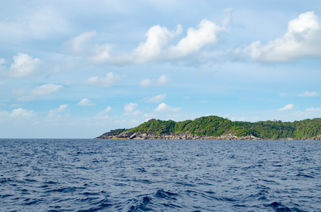 Beautiful Seascape with Focus on the Forest on the Mountain Rock in the Sea at Similan Islands, Thailand.の写真素材
