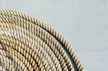 Close up One-fourth Marine Rope Coil on a Floor by Top View.の写真素材