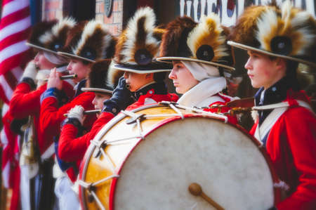 Saint Charles, MO--Dec 9, 2018; historic actors perform as British colonial fife and drum corps during christmas event downtownのeditorial素材