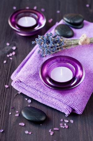 Zen stones, candles and lavender for the spa.の写真素材
