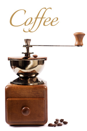 coffee grinder with coffee beans on a white backgroundの写真素材