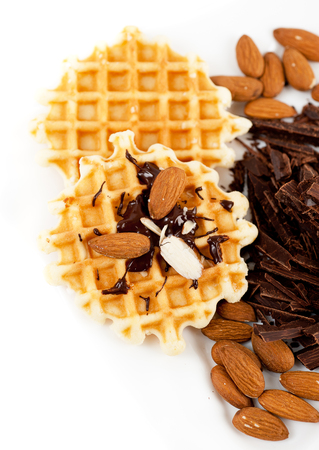 Sweet waffles with walnuts and chocolateの写真素材