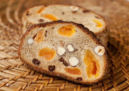 Whole-grain bread with nuts and dried fruitの写真素材