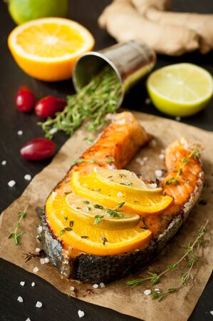 Grilled salmon, lime, orange and gingerの写真素材