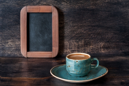 Espresso coffee and chalk board menu on vintage wooden backgroundの写真素材