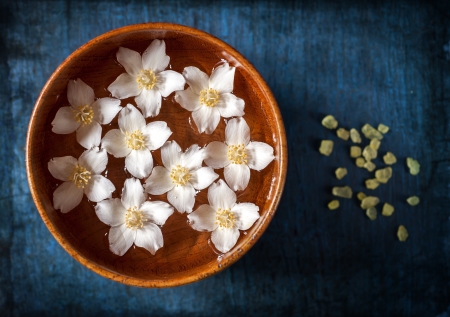Spa. Flowers in a bowl with water and sea saltの写真素材