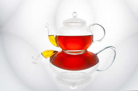 Transparent teapot with teaの写真素材