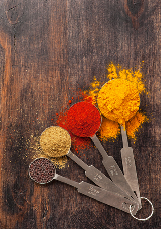  Spices coriander, paprika, curry, mustard seeds. Spice over Wood.の写真素材