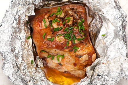 Pork baked in foil. Top view, horizontalの写真素材