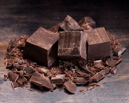 Dark chocolate on rustic backgroundの写真素材