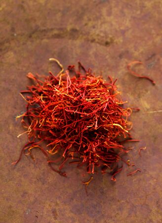 Saffron Spice. Saffron spices top view. Seasonings, condiments. Cooking ingredients, flavorの写真素材