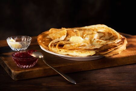 Pancakes with jam and butterの写真素材