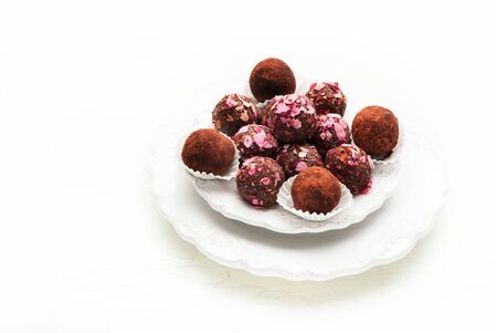 Homemade candies chocolate truffles on a plate