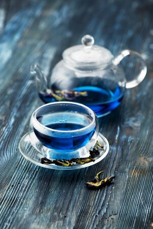 Organic blue tea Anchan in a teapot and a cupの写真素材