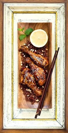 Grill chicken spicy legs with riceの写真素材