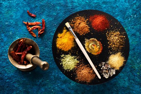 Powder of various spices and seasonings, top viewの写真素材