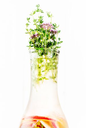 Summer fruit detox lemonade in a bottleの写真素材