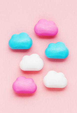 cute clouds on a pink background. baby or newborn background