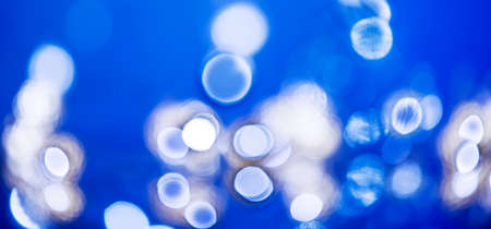 Christmas abstract background with garland lights. Christmas lights. Blurred bokeh.の写真素材