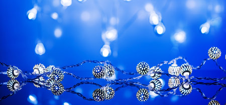 Christmas abstract background with garland lights. Christmas lights. Blurred bokeh.の写真素材