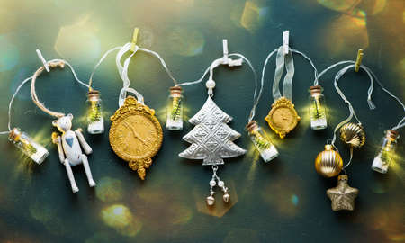 Ð¡hristmas toys, decorations and garland, top view. Festive new year banner