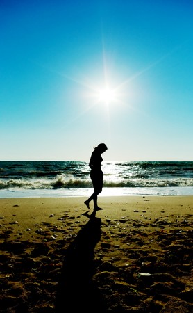 Girl walk on deach. Element of design.の写真素材