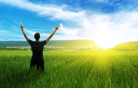 Man in green meadow. Emotional scene. Man in green meadow. Emotional scene.