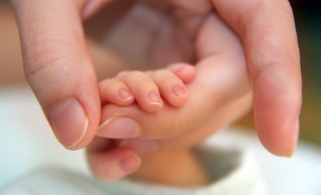 Small baby hand. Shallow depth-of-field.