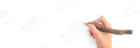 Hand with pencil. Conceptual design.