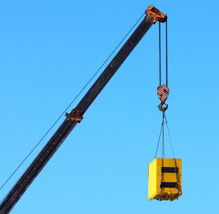 Crane and cargo. Element of building design.