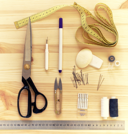 Set of tools and accessories for sewing. View from top. Element of design.