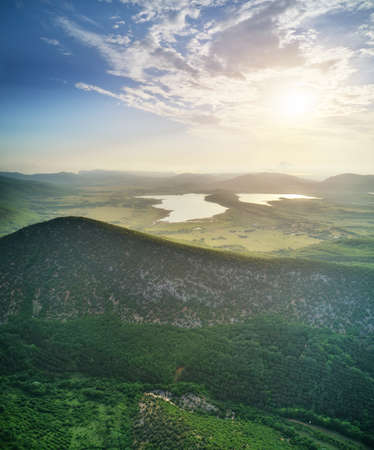 Big lake in mountain valley. Aerial panorama nature scene.の写真素材