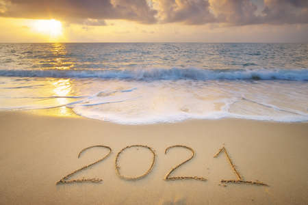 2021 year on the sea shore during sunset