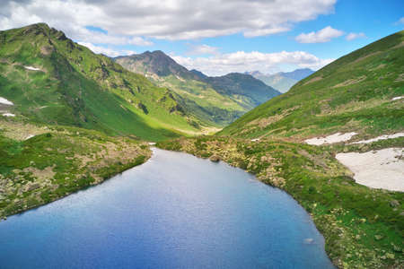 Aerial beautiful summer landscape of Caucasus mountain. Dukka lakes near Arkhyz village in Russia. Daylight mountain landscape.の写真素材