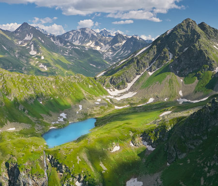 Aerial beautiful summer panorama landscape of Caucasus mountain. Skazka of Caucasus lake near Arkhyz village in Russia. Daylight mountain landscape.の写真素材