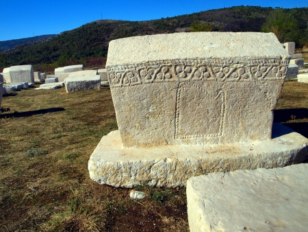 Ancient tombs in the field by the road, Radimlja, Stolac, Bosniaの写真素材