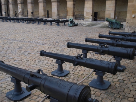 Historic cannon on the square in museum Les Invalides, Paris, France のeditorial素材