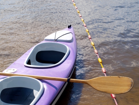 Empty canoe on the bank of Lakeの写真素材