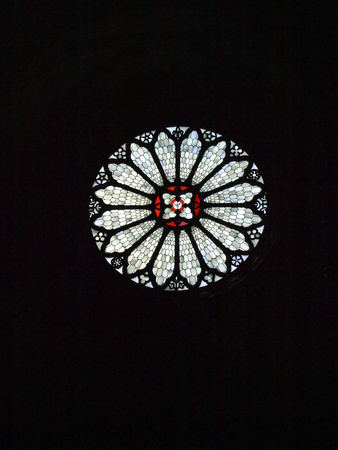 round window with ornate stained glass of Cathedral of Trento in Italyのeditorial素材