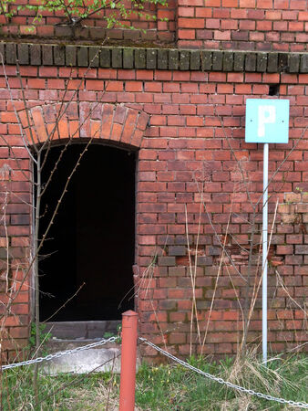 Old ruined wall with a window without securityの写真素材