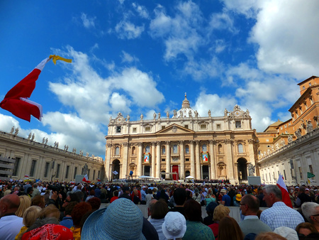 ROME, VATICAN - April 28, 2014  polish pilgrims listen to the mass during the canonization John Paul II and John XXII  on 28 April 2014のeditorial素材