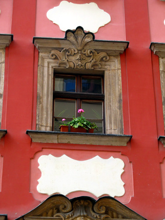 ornate windows and ornaments on the outer walls of the old city of Wroclaw, Polandの写真素材
