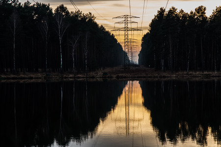 High voltage after sunset in the evening in winterの写真素材